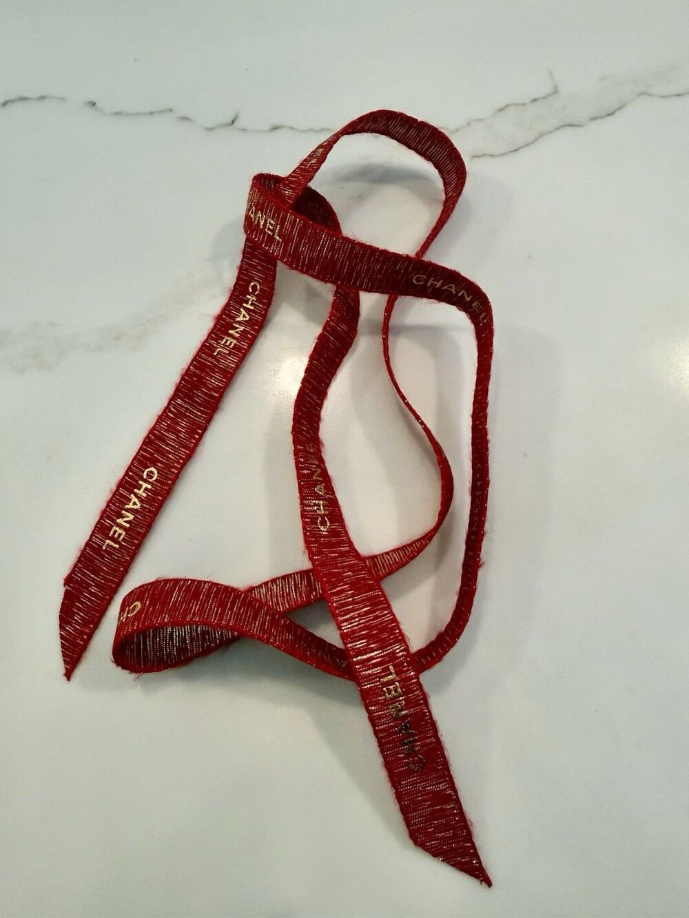 CHANEL Holiday Gift Ribbons (red/gold)